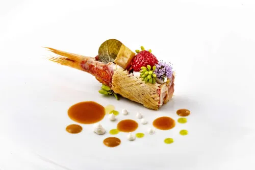Exquisite a la carte gourmet dish, embodying Italian and Mediterranean cuisine at 7Pines Resort Sardinia.