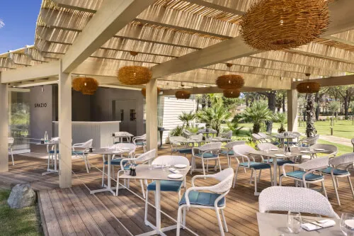 Patio at Spazio by Franco Pepe, 7Pines Resort Sardinia, perfect for enjoying classy pizza.