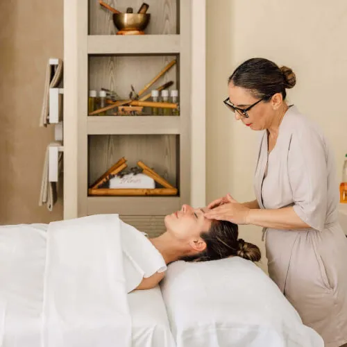 Woman receiving a bespoke massage at Pure Seven, 7Pines Resort Sardinia